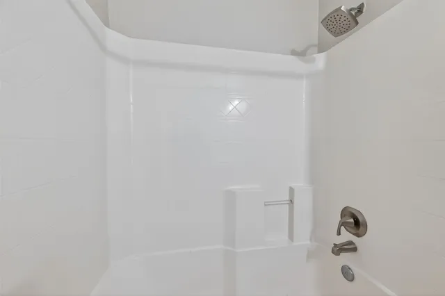 a close up of a bathtub