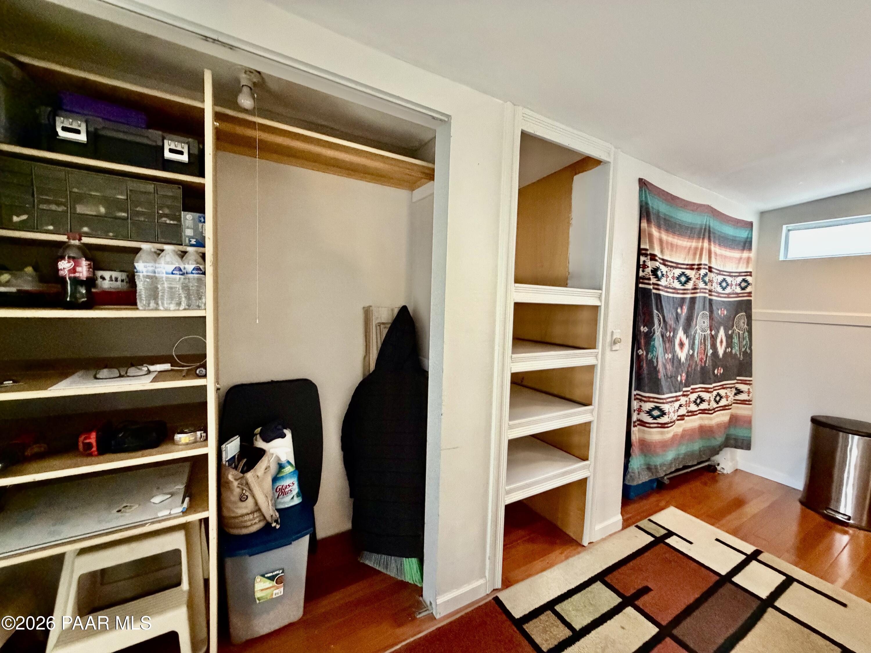 837 Division Street, Unit 32 Prescott, AZ 86301 - Photo 17 of 21 a view of walk in closet with clothes and shoes
