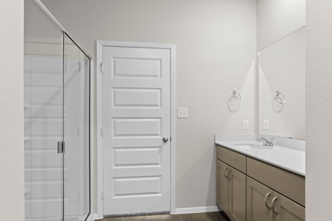 108 Summer Drive Elgin, TX 78621 - Photo 29 of 35 a bathroom with a shower and a sink