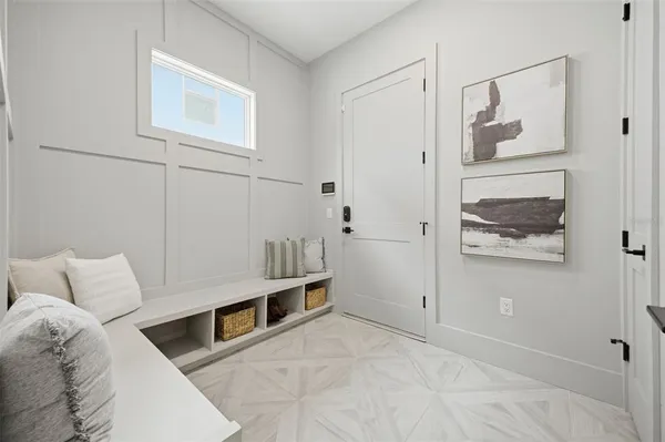 a kitchen with stainless steel appliances granite countertop a refrigerator and a stove
