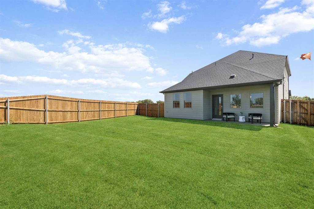 1855 Balfour Bend Forney, TX 75126 - Photo 28 of 28 Backyard in the Magnolia home plan by Trophy Signature Homes – REPRESENTATIVE PHOTO