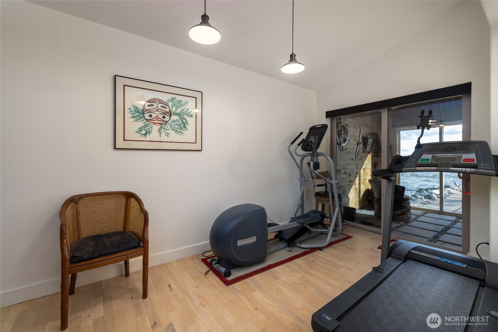 13207 Satterlee Road Anacortes, WA 98221 - Photo 14 of 40 a room with gym equipment and windows