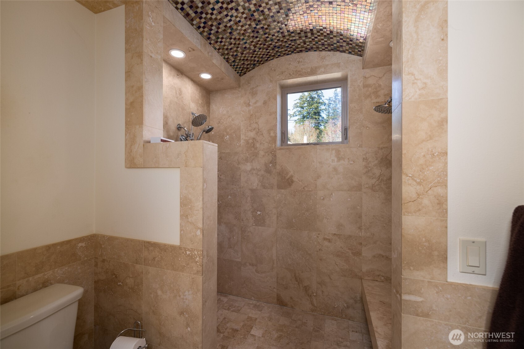 13207 Satterlee Road Anacortes, WA 98221 - Photo 19 of 40 a bathroom with a toilet sink and shower