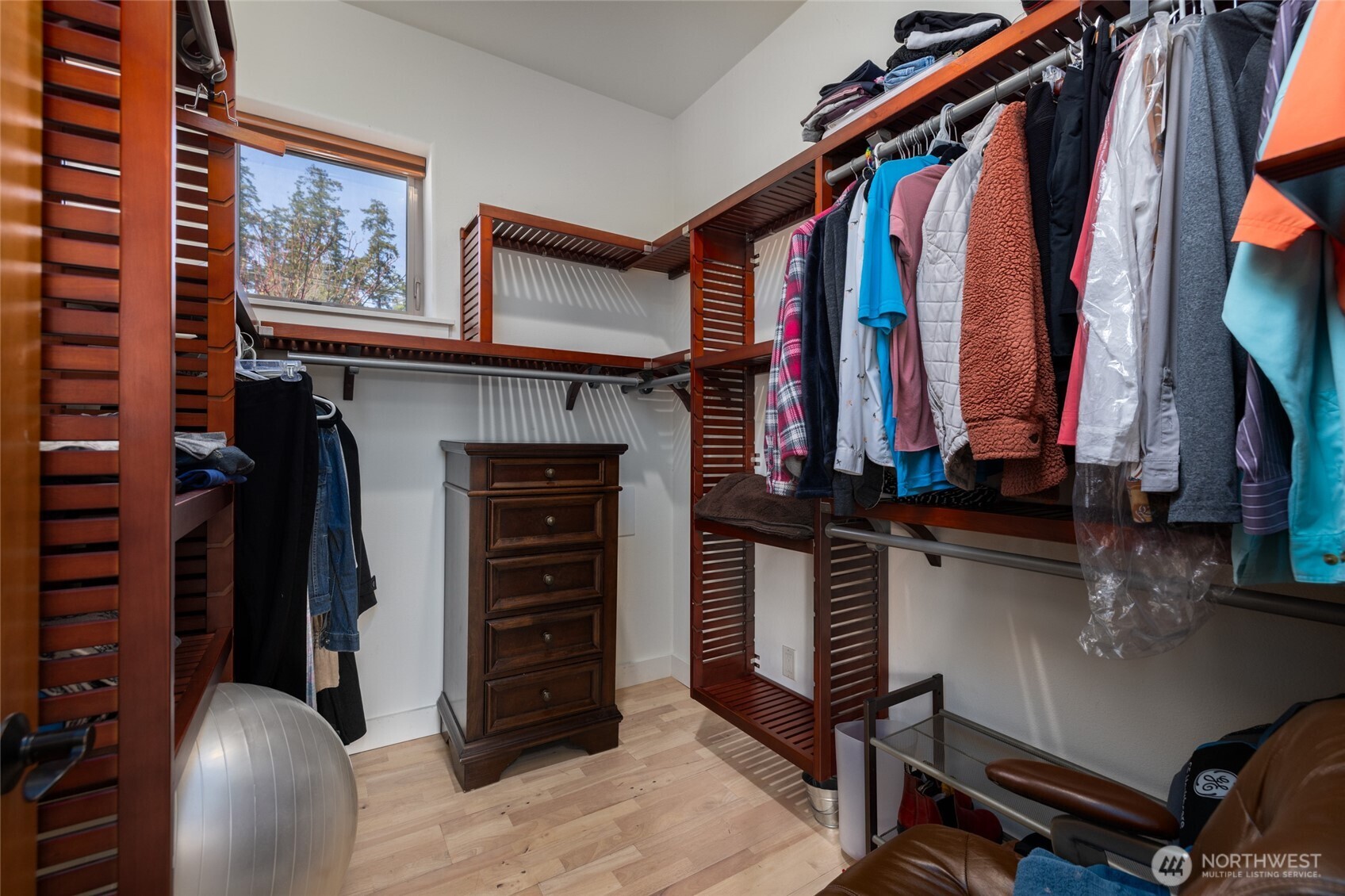 13207 Satterlee Road Anacortes, WA 98221 - Photo 20 of 40 a view of walk in closet with clothes and shoes