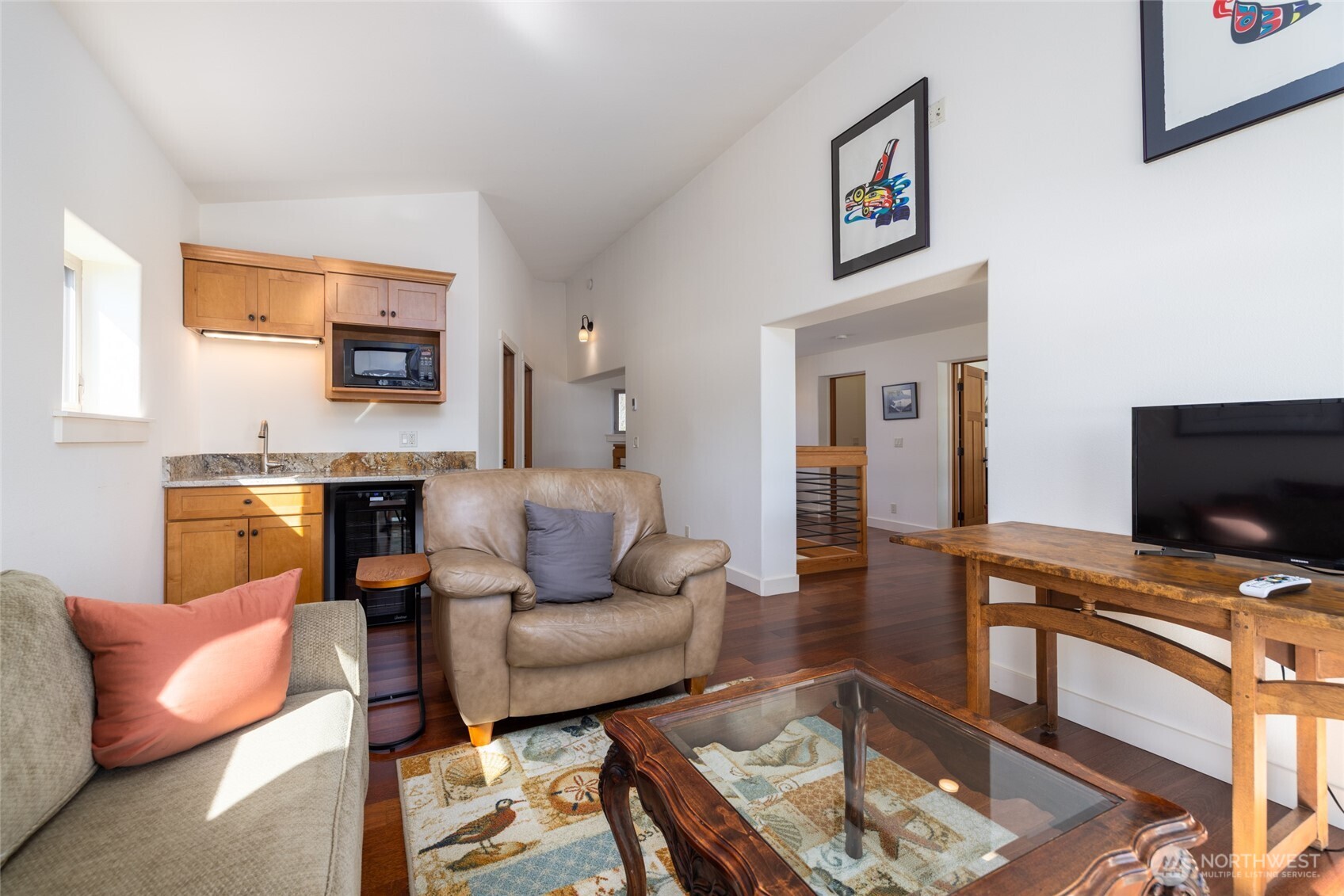 13207 Satterlee Road Anacortes, WA 98221 - Photo 24 of 40 a living room with furniture and a flat screen tv