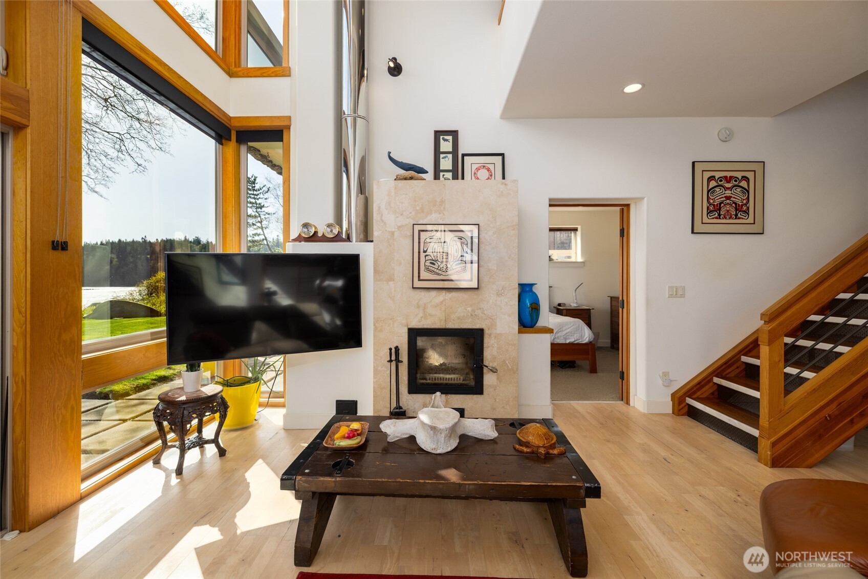 13207 Satterlee Road Anacortes, WA 98221 - Photo 7 of 40 a living room with furniture and a flat screen tv