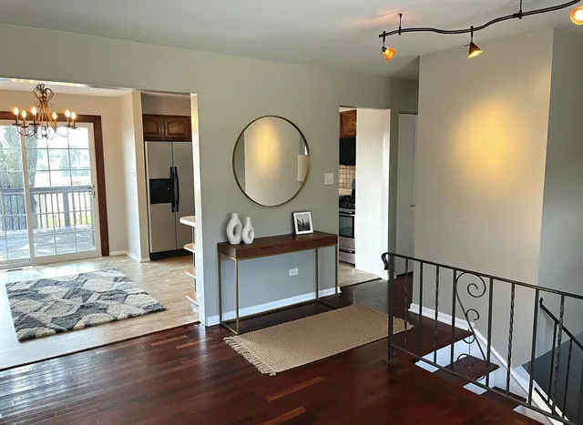 a living room with wooden floor