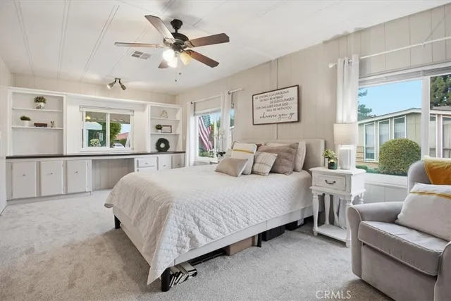 a bed room with a bed and a couch