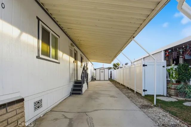 a view of a street with a building in the background