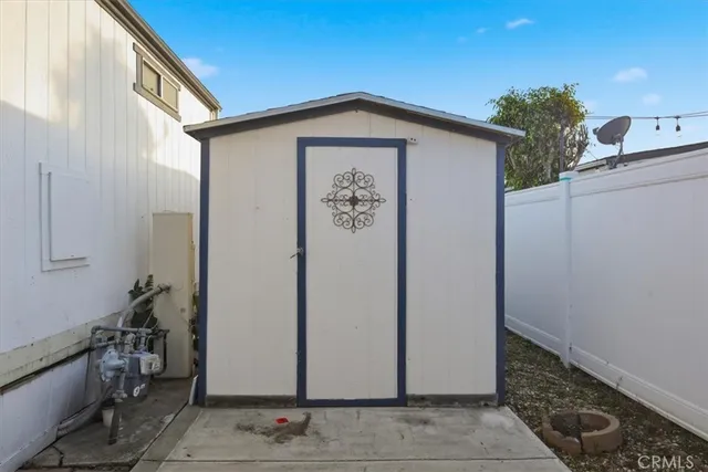 a front view of a house with parking space