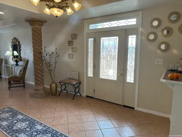 a view of livingroom with furniture and windows
