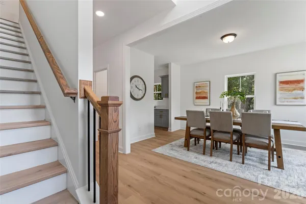 a view of a livingroom with furniture and entryway