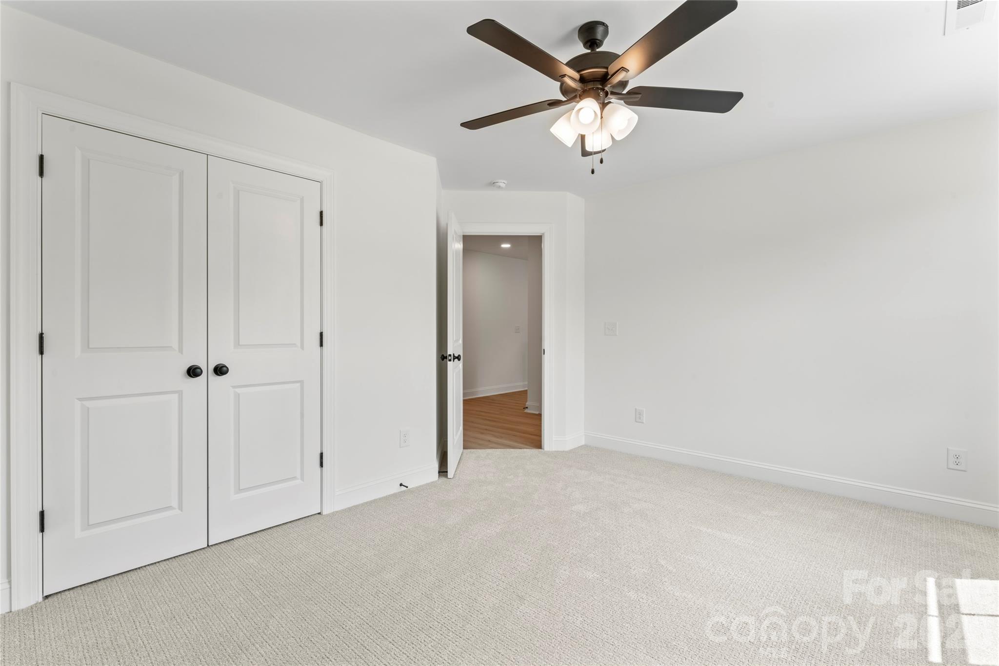 5234 Rocky River Crossing Road Harrisburg, NC 28075 - Photo 22 of 34 a view of an empty room