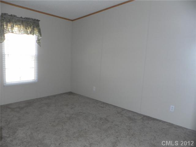 2461 Campbell Lake Road Lancaster, SC 29720 - Photo 5 of 8 an empty room with a window
