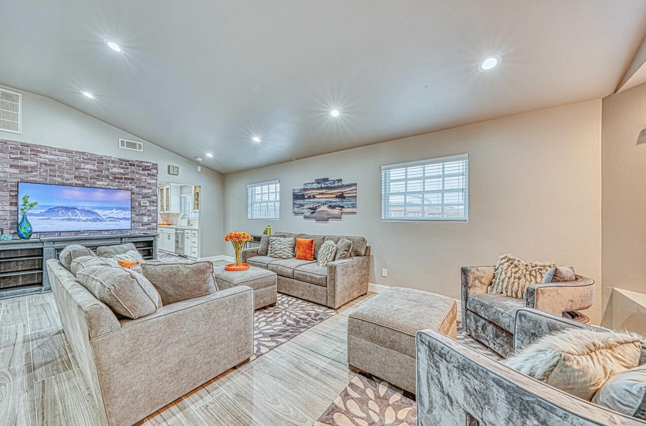 7550 Sandholdt Road Moss Landing, CA 95039 - Photo 12 of 85 a living room with furniture and a flat screen tv