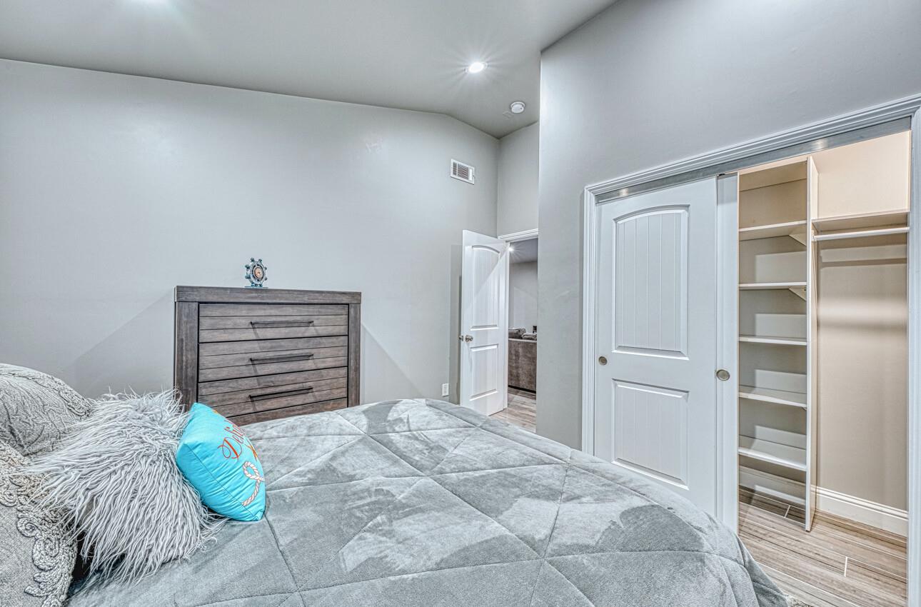 7550 Sandholdt Road Moss Landing, CA 95039 - Photo 19 of 85 a bedroom with a bed and a window