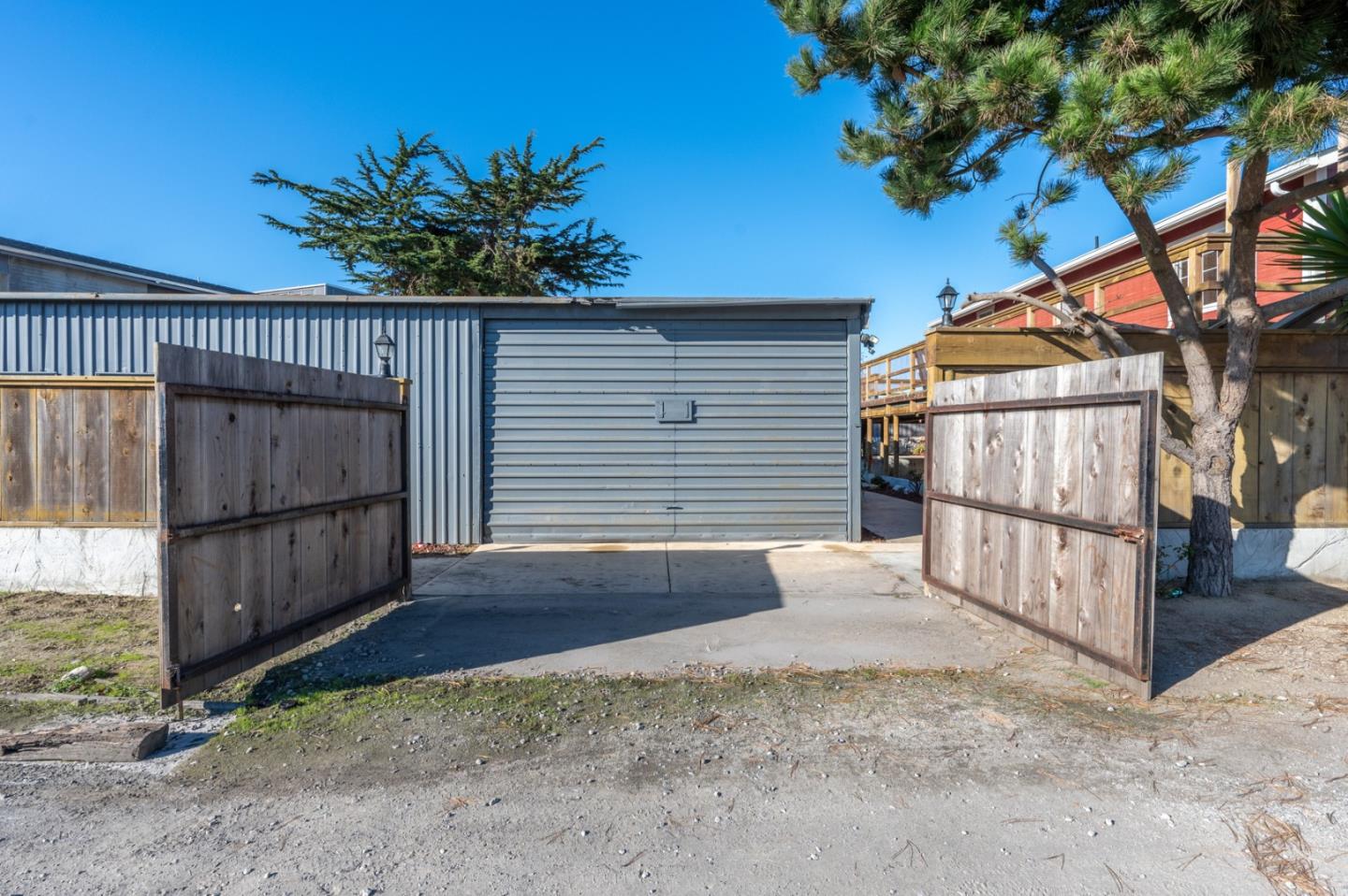 7550 Sandholdt Road Moss Landing, CA 95039 - Photo 26 of 85 a view of backyard with small cabin and wooden fencing