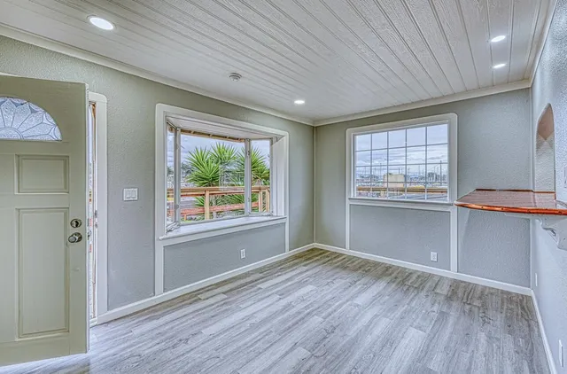 an aerial view of a house with swimming pool