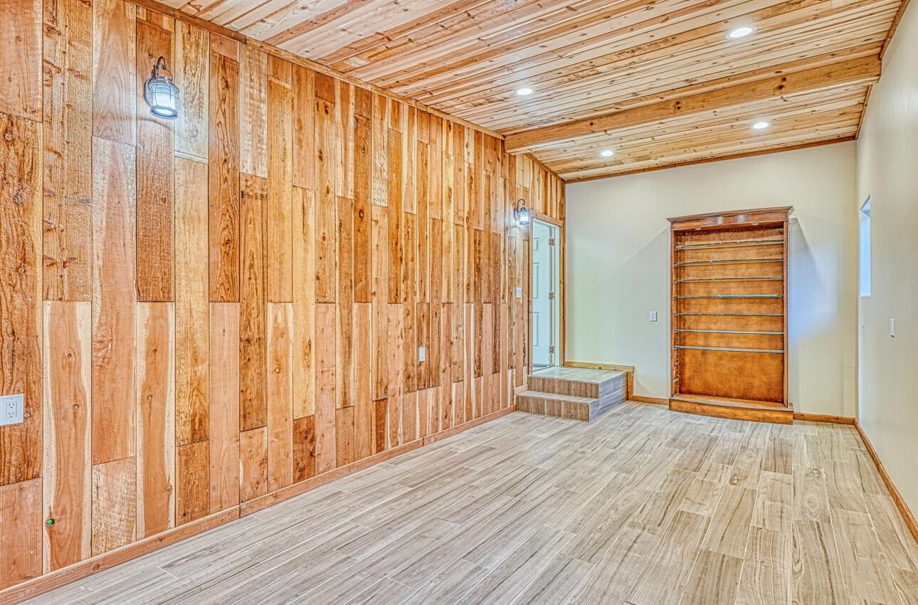 7550 Sandholdt Road Moss Landing, CA 95039 - Photo 65 of 85 a view of a room with wooden floor and natural light