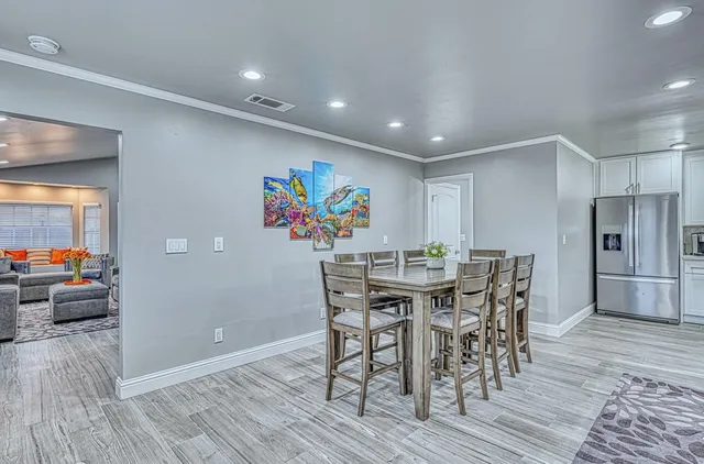 a bathroom with a granite countertop toilet sink and bathtub