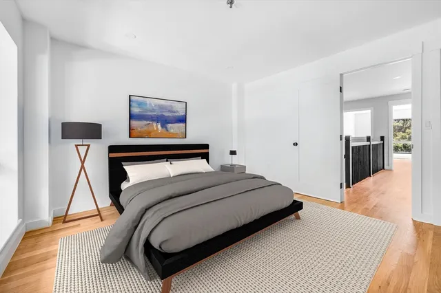a view of a bathroom with a bathtub and a toilet