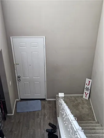 a bath tub sitting in a room next to a window