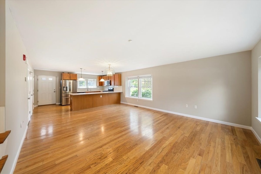 6 Bates Street, Unit A Devens, MA 01434 - Photo 2 of 41 a view of a kitchen with a sink and a window