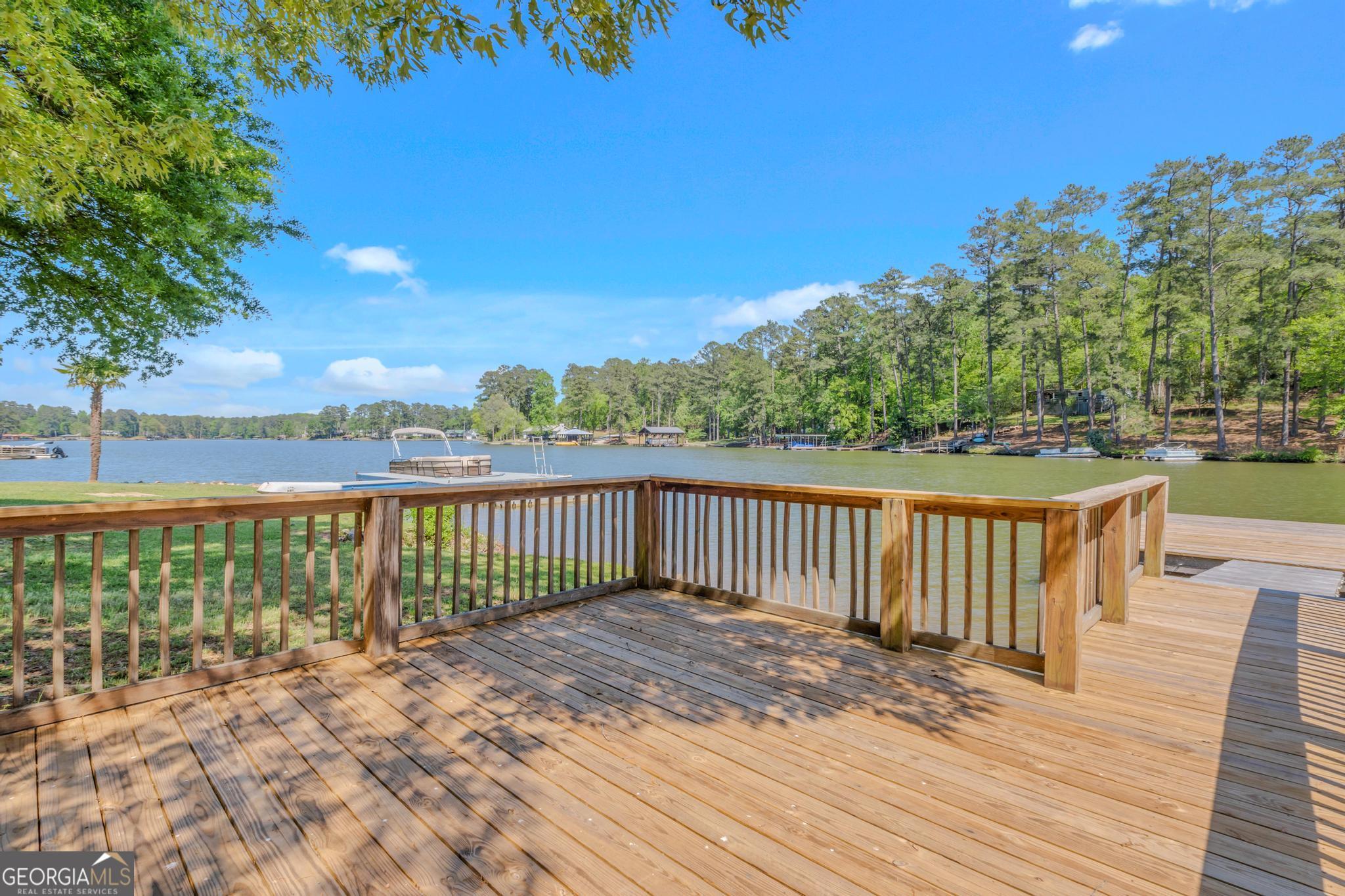 136 Yancey Road Jackson, GA 30233 - Photo 27 of 37 a view of balcony with wooden floor and outdoor space