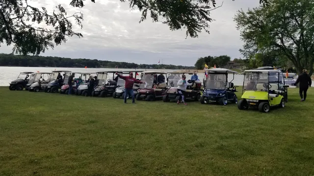 a view of a house with swimming pool and sitting area