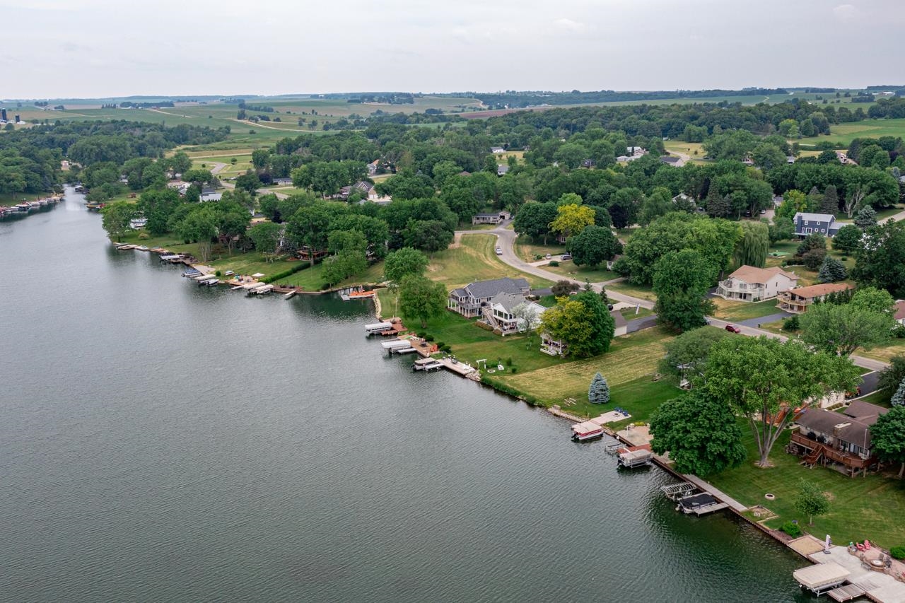 1306 Chadbourne Drive Lake Summerset, IL 61019 - Photo 3 of 56 an aerial view of green landscape with trees houses and lake view