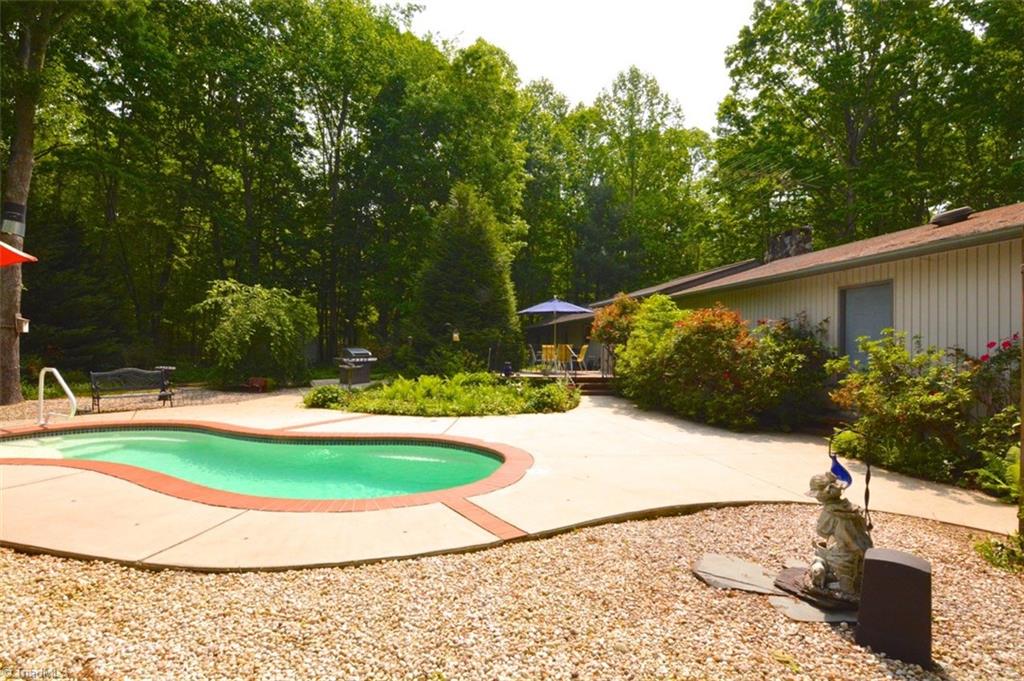 109 Mersey Road Greensboro, NC 27406 - Photo 2 of 28 A beautifully landscaped rear yard has a fiberglass pool just right for you and not much effort to maintain. A new Trane pump & air handler was put in 7 years ago with upgrades to the system.