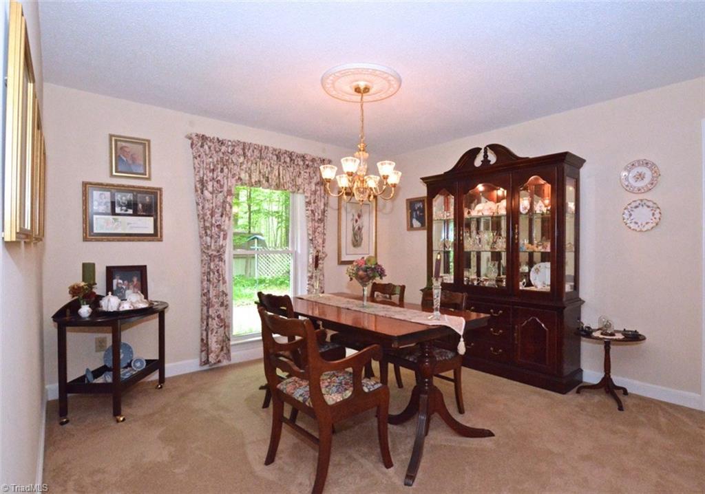 109 Mersey Road Greensboro, NC 27406 - Photo 11 of 28 The dining room is also very spacious. It overlooks the rear yard.