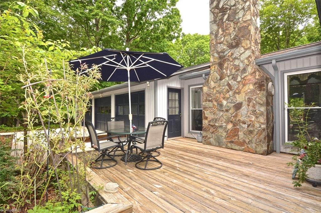 109 Mersey Road Greensboro, NC 27406 - Photo 19 of 28 This large deck is on the front of the home...A great place to relax or entertain.