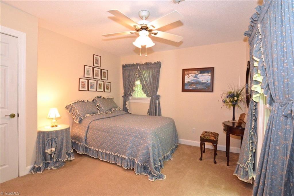 109 Mersey Road Greensboro, NC 27406 - Photo 21 of 28 Two other bedrooms also have ceiling fans, new carpet and paint with amply sized closets.