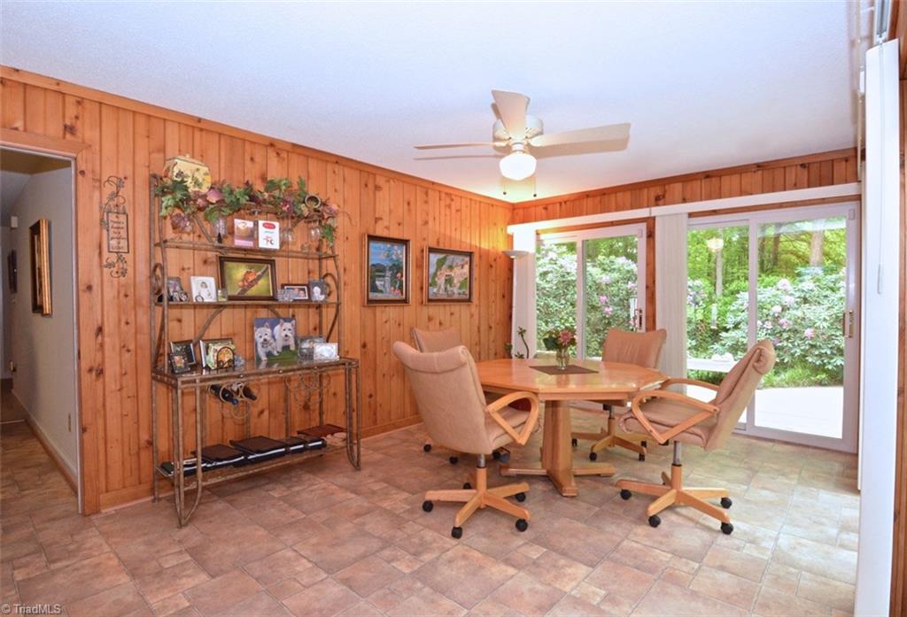 109 Mersey Road Greensboro, NC 27406 - Photo 4 of 28 Enjoy your tongue and groove sunroom with 8 Champion lifetime doors.... the insulation is fabulous!! Sellers were so pleased with the remodeling of this room.