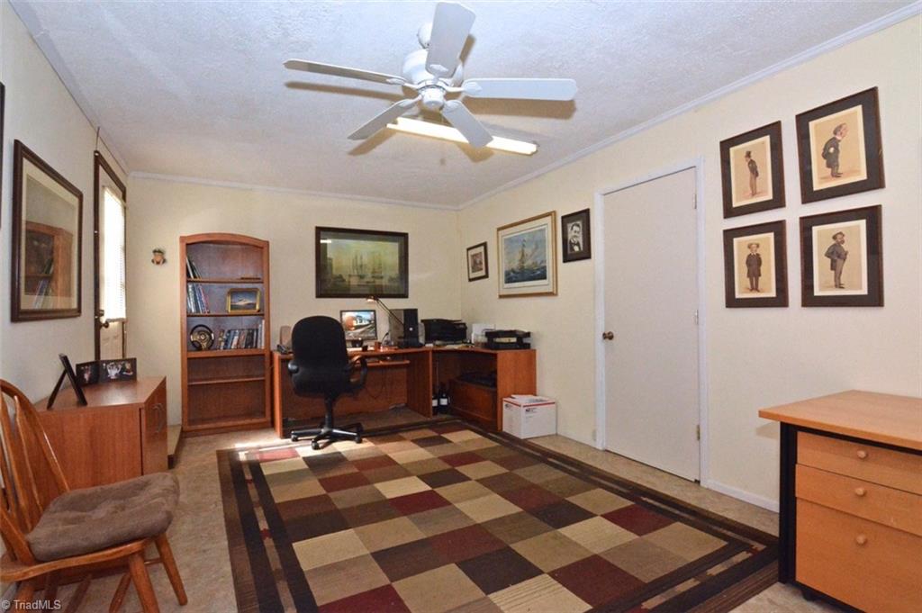 109 Mersey Road Greensboro, NC 27406 - Photo 10 of 28 A generously sized office was remodeled from the third bay of the garage. It has an outside entrance and is accessible fro the den. It provide an additional square footage of 276 insulated sq. feet to the home. It is cooled but not heated but stays warm year round. It also has an entrance to the garage.