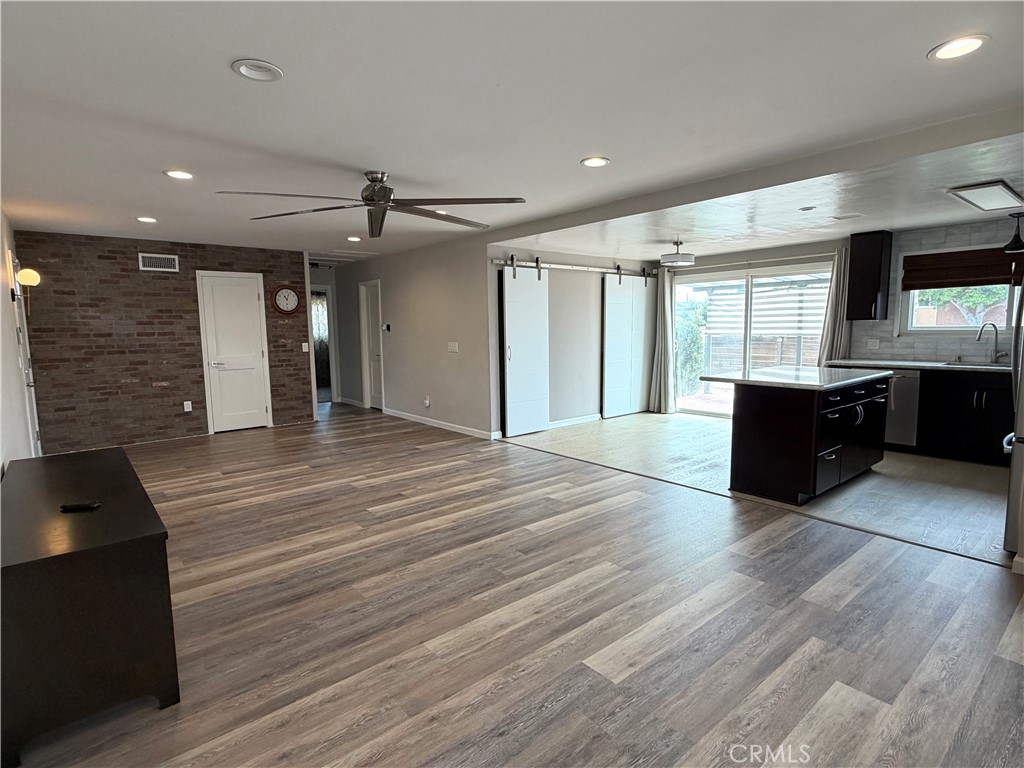 8657 Rumson Drive Santee, CA 92071 - Photo 18 of 65 a view of kitchen with cabinets and window