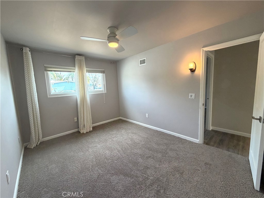 8657 Rumson Drive Santee, CA 92071 - Photo 39 of 65 an empty room with windows and closet