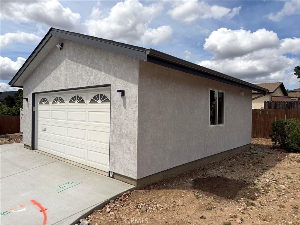 8657 Rumson Drive Santee, CA 92071 - Photo 47 of 65 a black and white building with a outdoor space