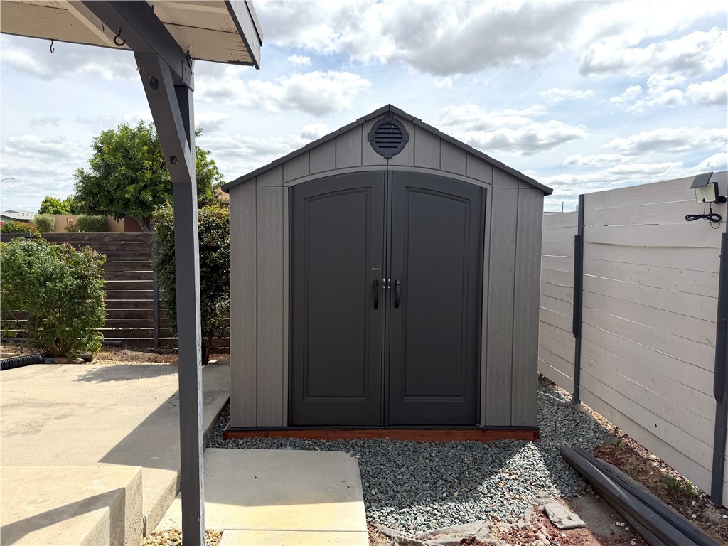 8657 Rumson Drive Santee, CA 92071 - Photo 63 of 65 a wooden door with a outdoor space