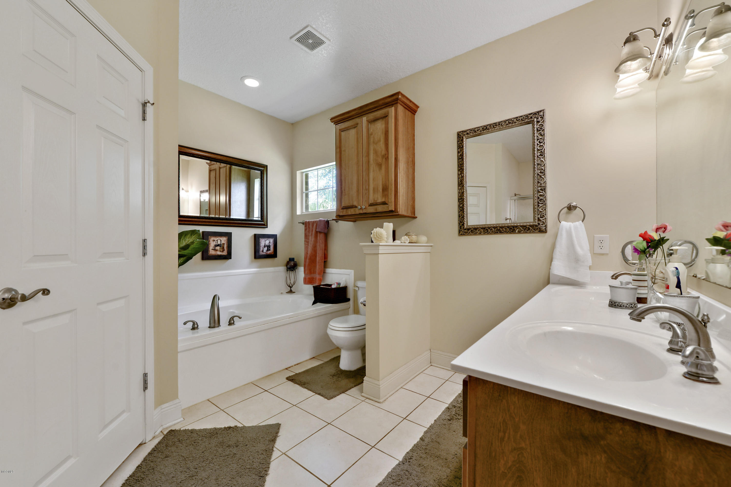 6428 Poco Road Ocean Springs, MS 39564 - Photo 14 of 28 master bath