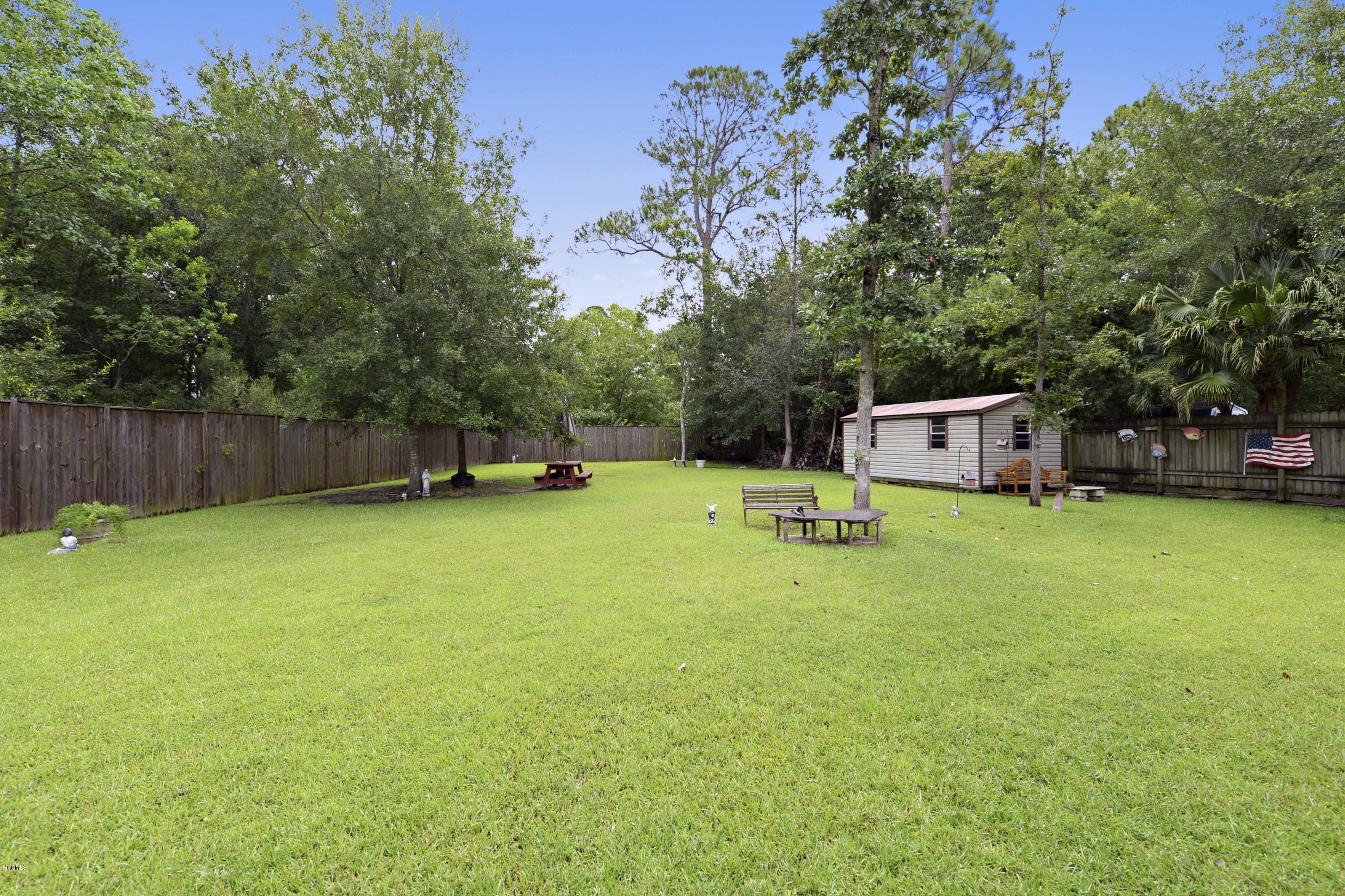 6428 Poco Road Ocean Springs, MS 39564 - Photo 20 of 28 backyard