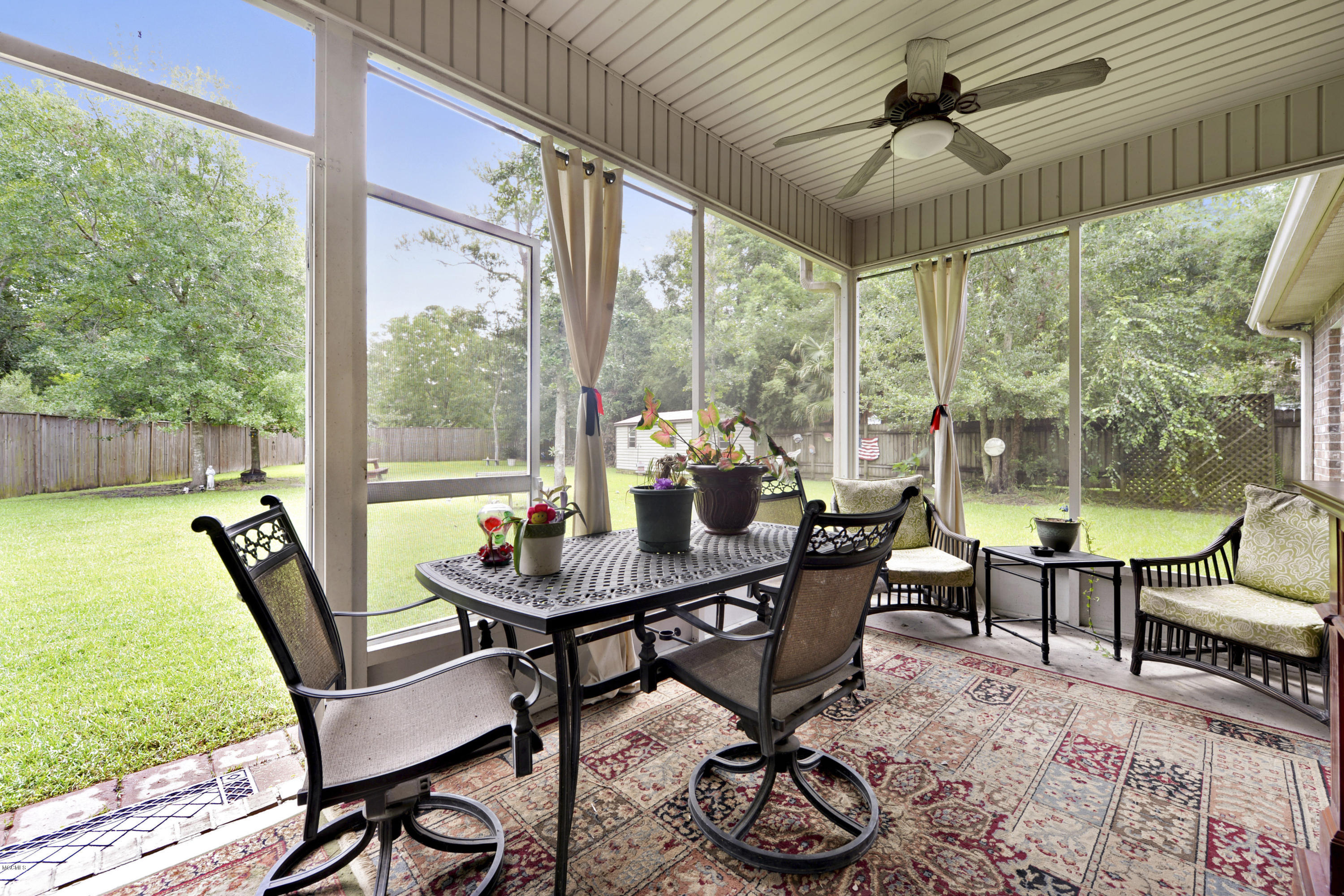6428 Poco Road Ocean Springs, MS 39564 - Photo 3 of 28 screened porch