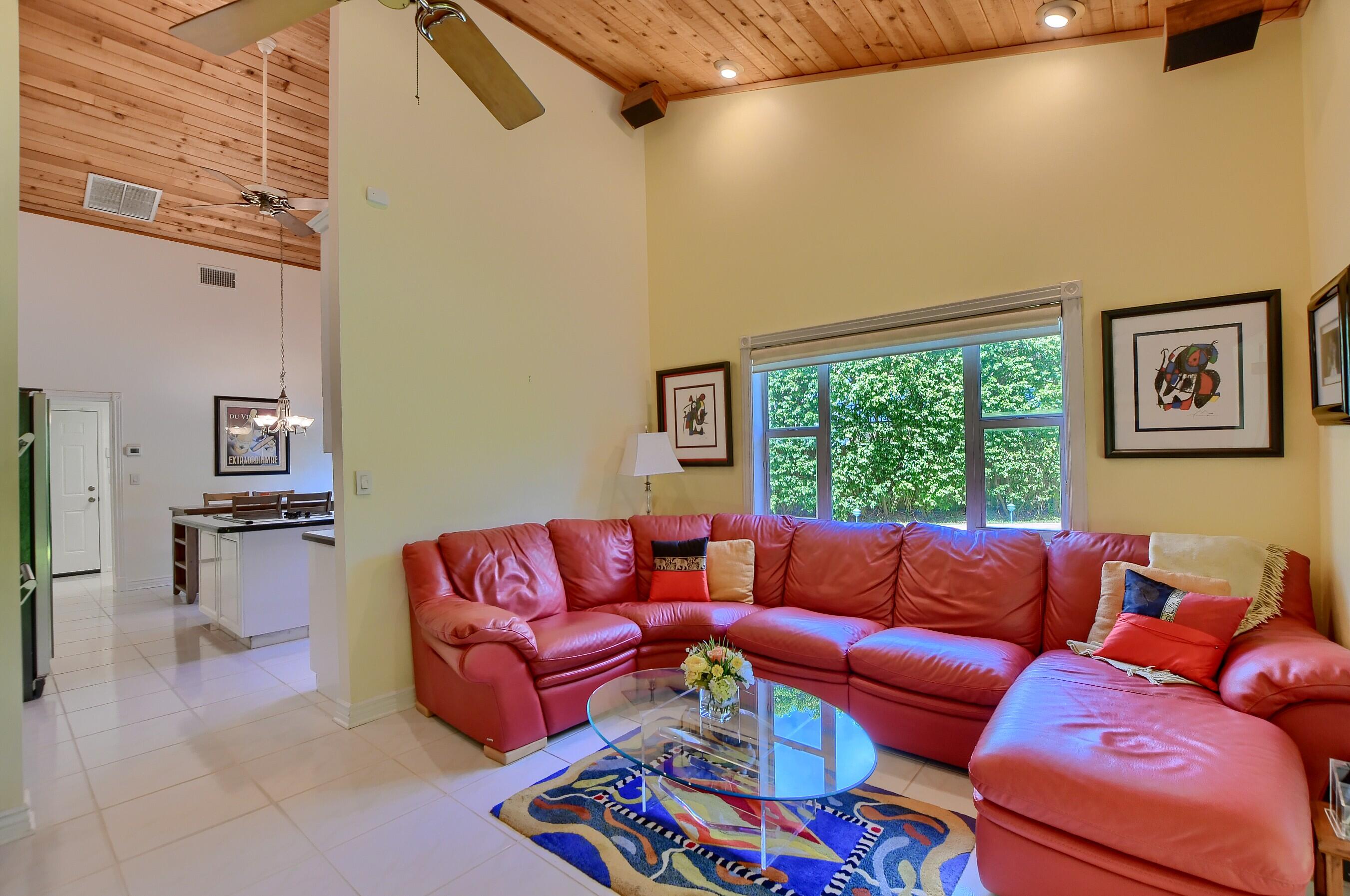 2845 Northwest 42nd Street Boca Raton, FL 33434 - Photo 16 of 60 a living room with furniture and a large window