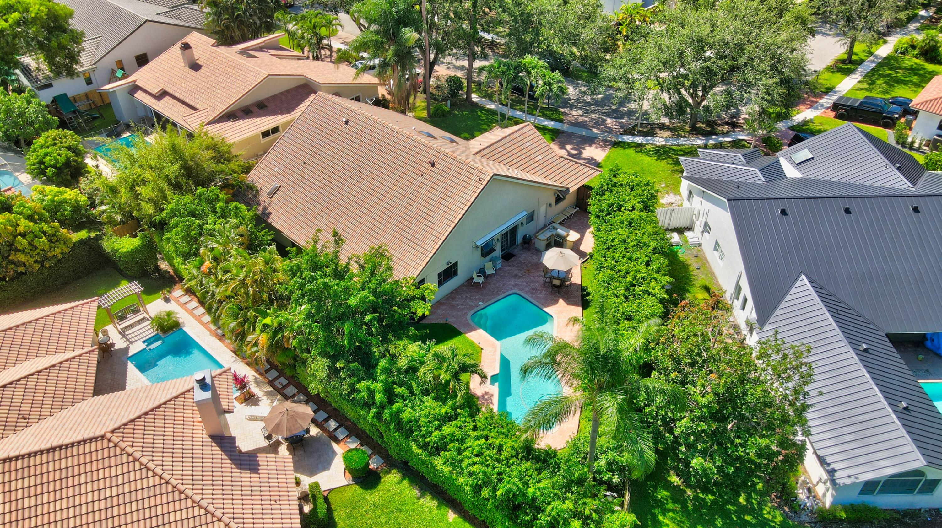 2845 Northwest 42nd Street Boca Raton, FL 33434 - Photo 51 of 60 an aerial view of a house with a yard
