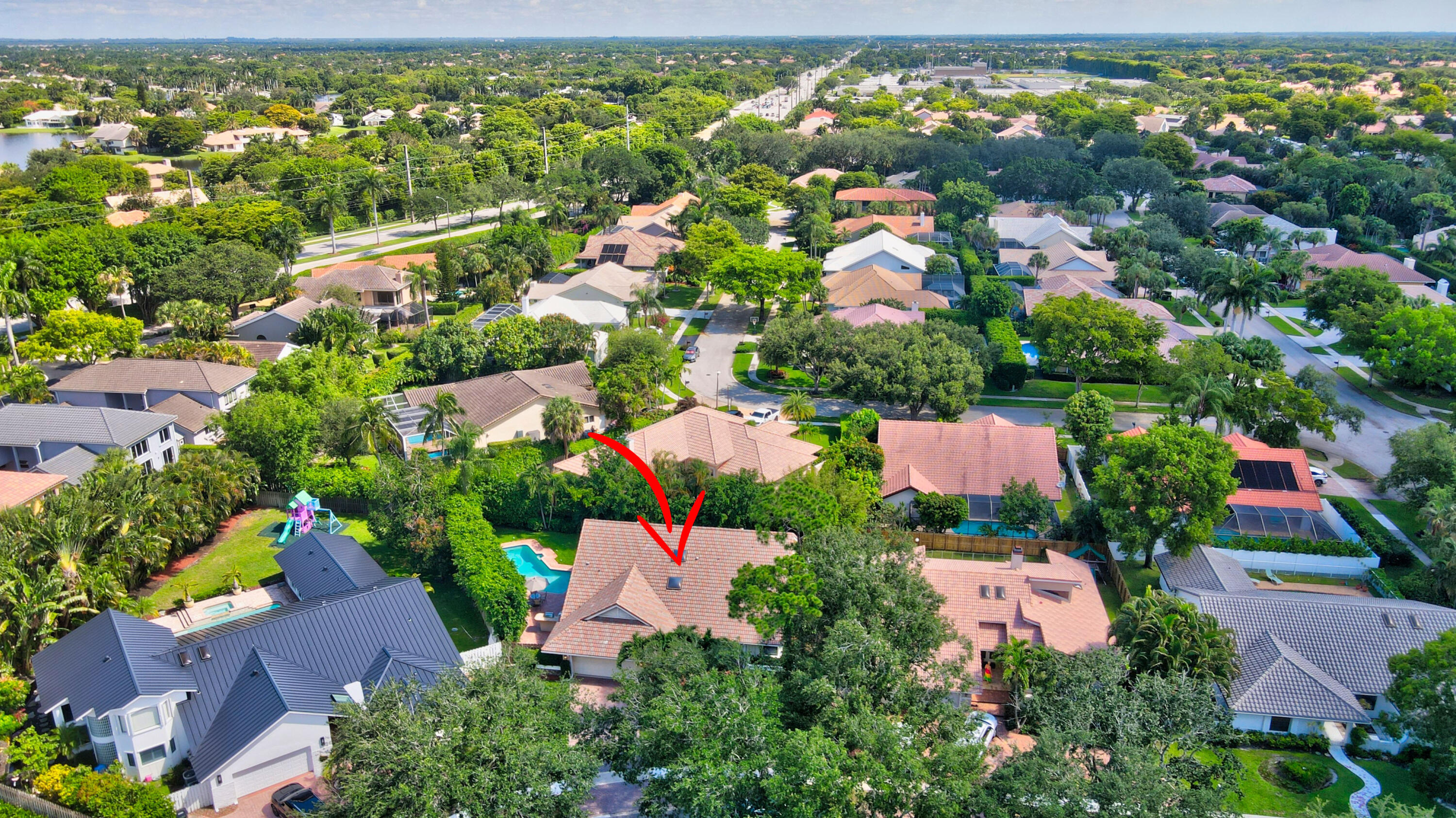 2845 Northwest 42nd Street Boca Raton, FL 33434 - Photo 54 of 60 an aerial view of residential houses with outdoor space and trees
