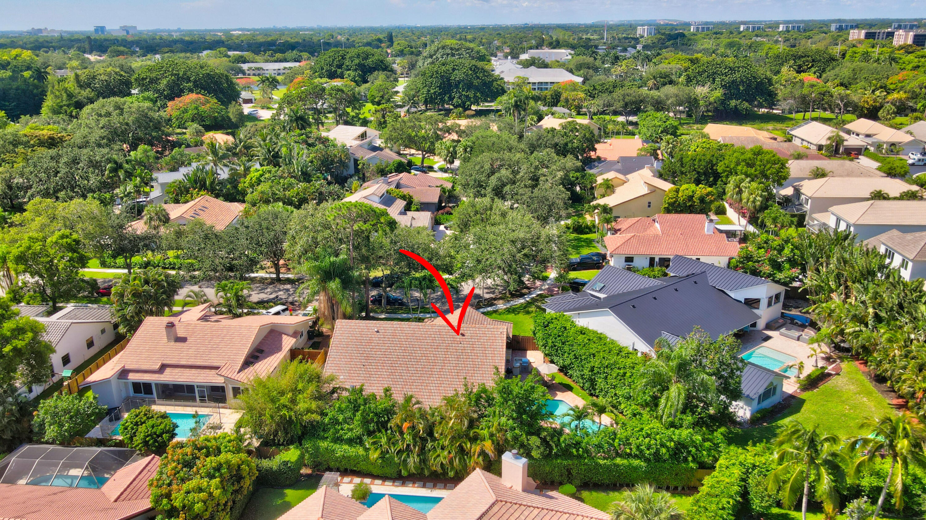 2845 Northwest 42nd Street Boca Raton, FL 33434 - Photo 58 of 60 an aerial view of residential houses with outdoor space and trees all around