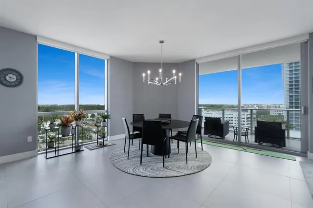 a dining room with furniture fireplace and a window