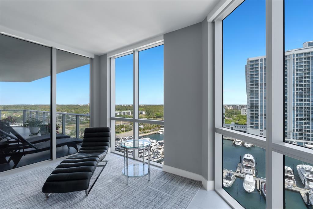 17111 Biscayne Boulevard, Unit 1101 North Miami Beach, FL 33160 - Photo 23 of 43 a view of a living room with furniture and floor to ceiling window