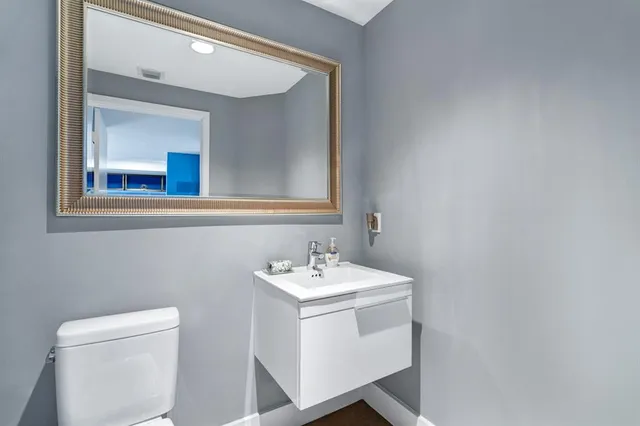 a bathroom with a sink and a toilet